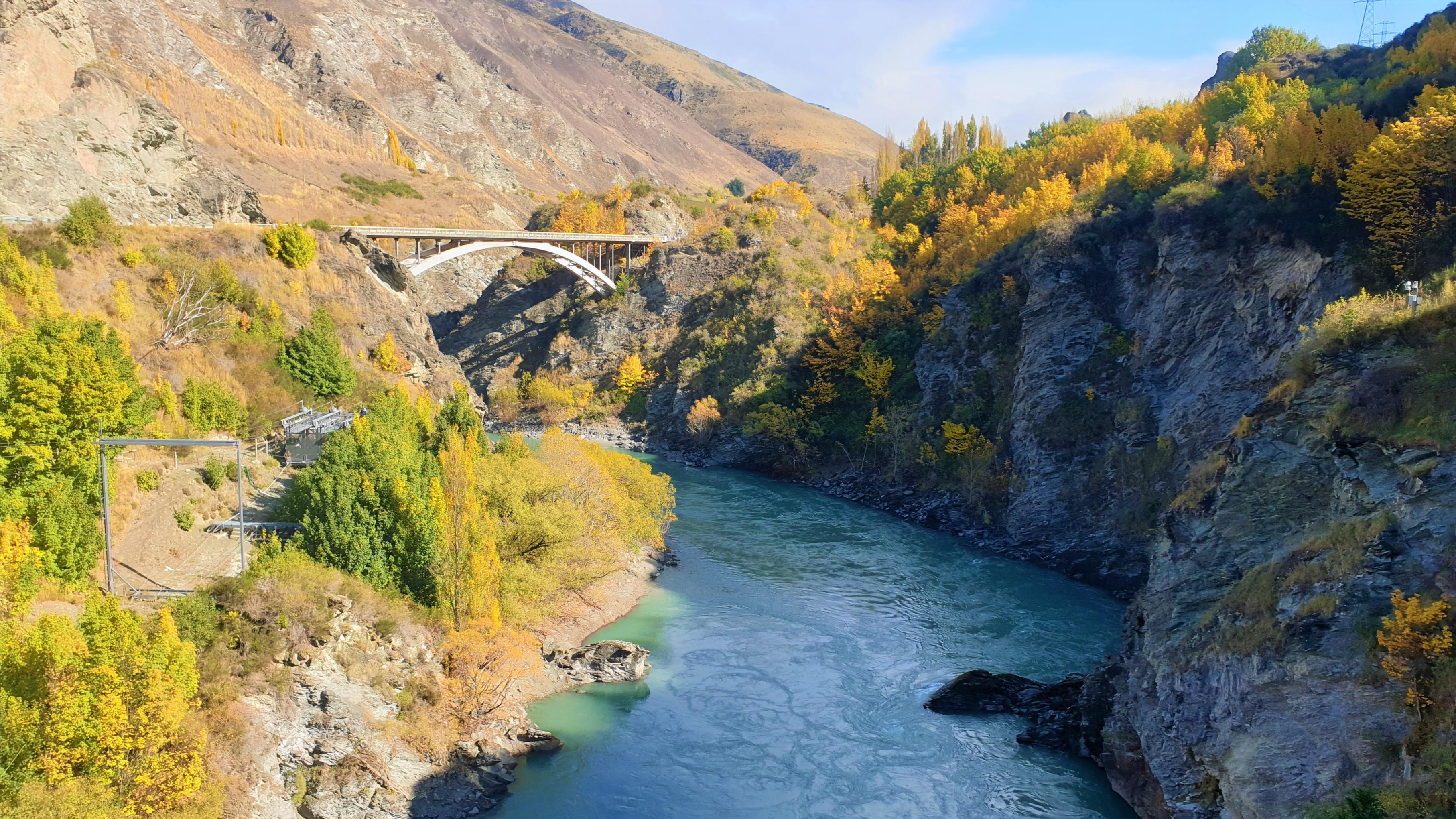Experience breathtaking views at Queenstown where rugged cliffs and a winding river create an unforgettable backdrop for exploration and relaxation. Perfect for those who delight in nature's splendor.